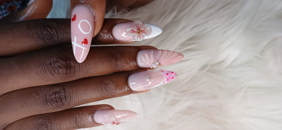 Manicure with abstract nail art at Glit Nails nail salon Accra