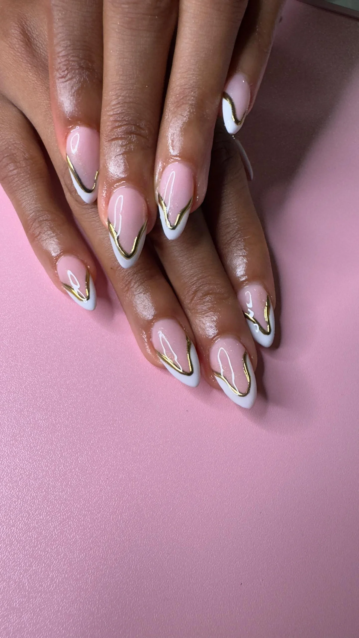 Classic manicure with glossy finish at Glit Nails nail salon Accra